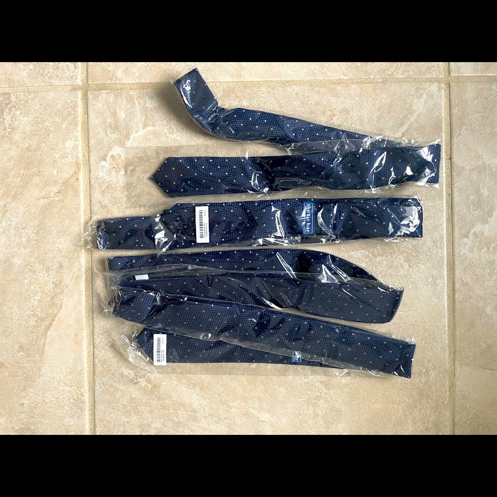 Four matching Tie Bar ties